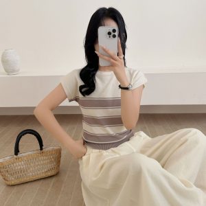 Knitted top, slim fit, casual, stylish, and flattering.