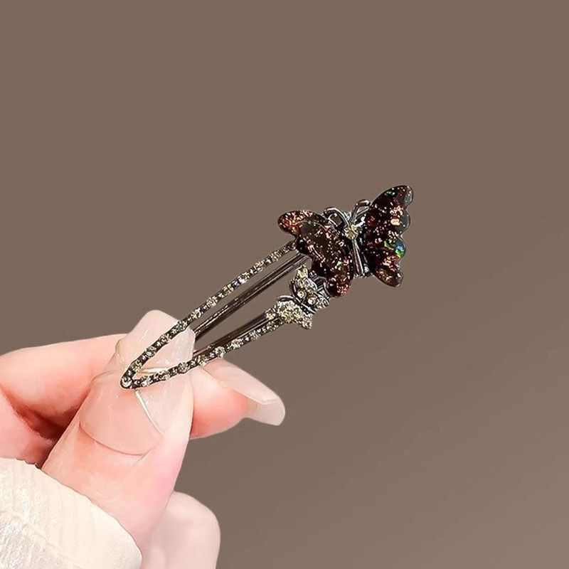 Black colored glaze butterfly hair clip