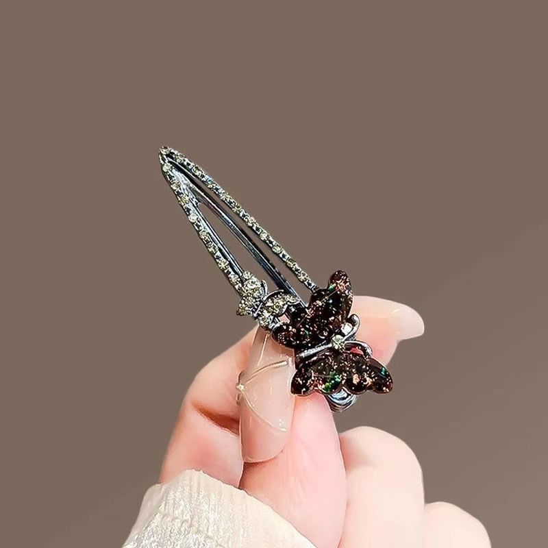 Black colored glaze butterfly hair clip - Image 3
